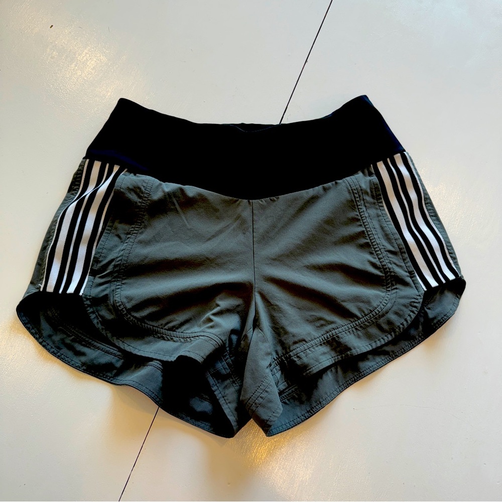 Athleta running shorts, green, with pockets, size 4